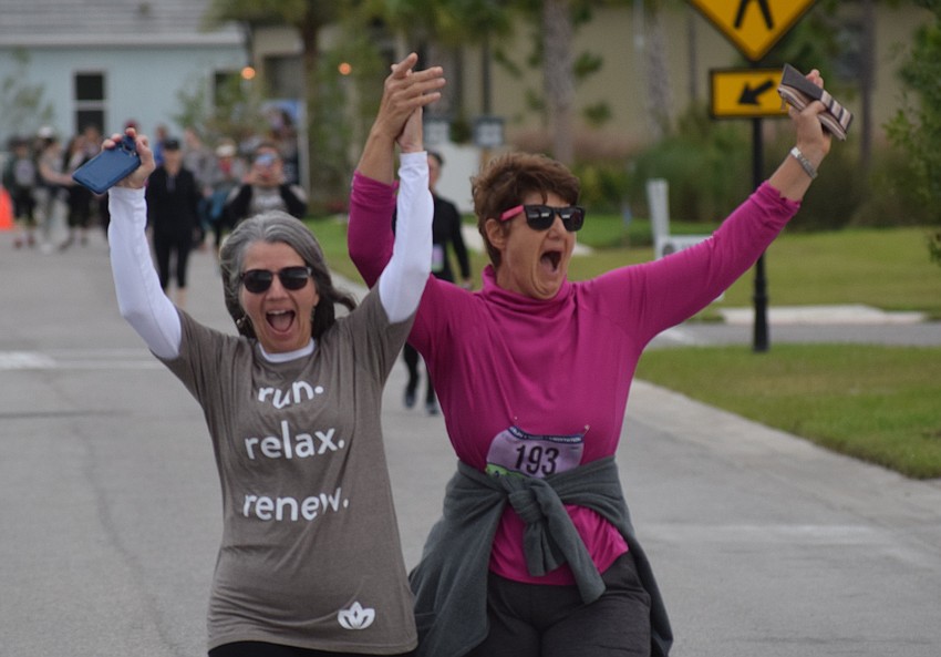 Gilbert McNeal Elementary was in the house with nurse Diane Bartoszek and teacher Jeannine Germer running the 5K.