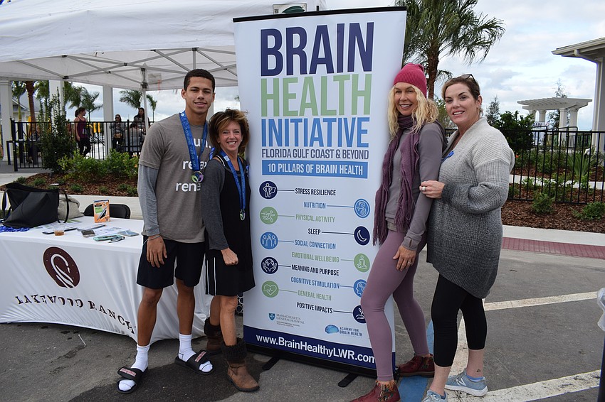 Hilton Hudson and his mom, Brain Health Initiative Executive Director Stephanie Peabody take a break with Trish Hart and Kim Miele.