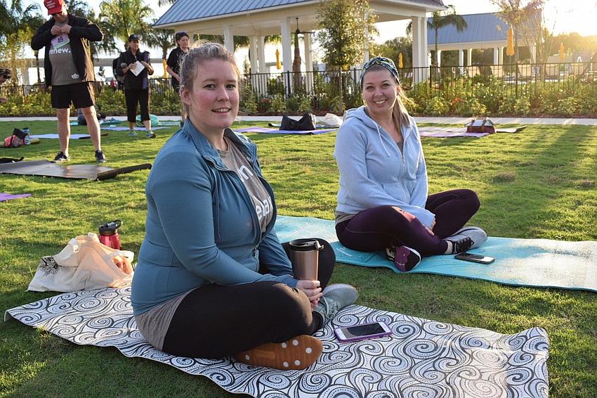 University Park's Sarah Dorsen and Sarasota's Brittany Lamb were two of the first entrants to pick a spot on the yoga lawn.