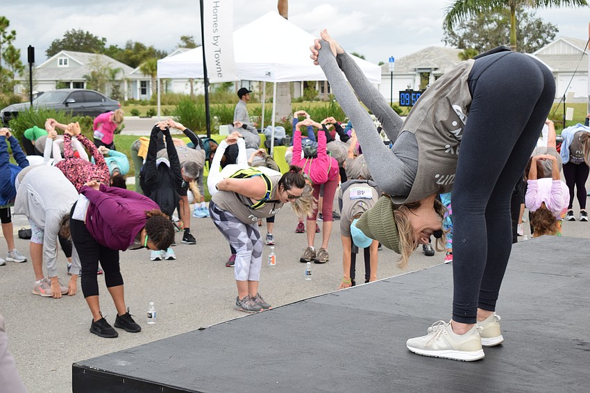 Yoga Shack owner Courtney Smith (right) must have been doing some wishful think if she expected the entrants to stretch in quite that position.