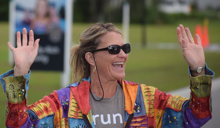 Jane Greene of Rotonda West celebrates her completion of the 5K. She said the event was a great experience and 