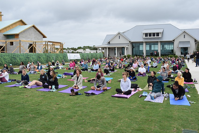 Entrants are ready for the yoga session to begin.