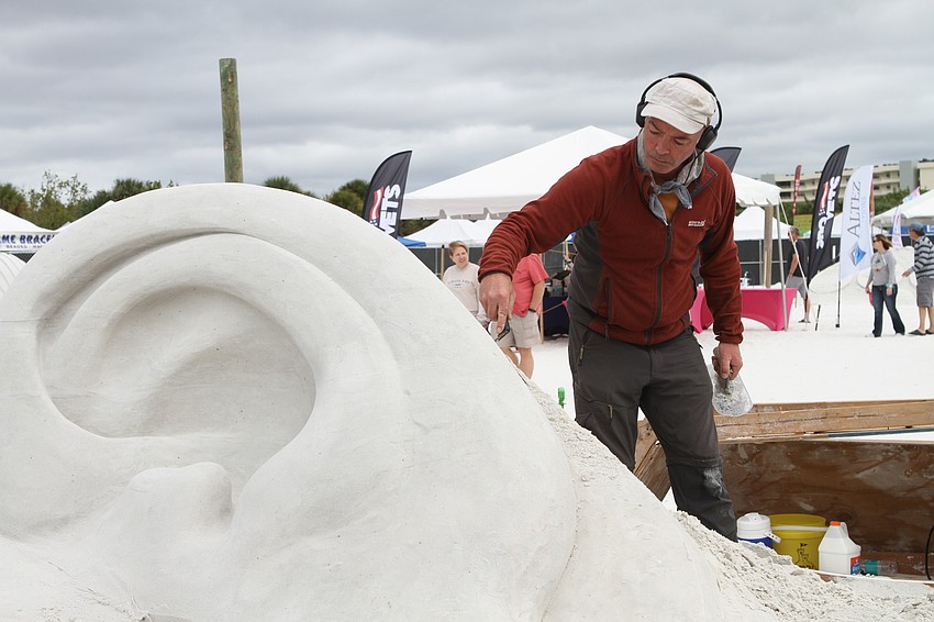 Ferguson Mulvaney sanded down his giant ear.