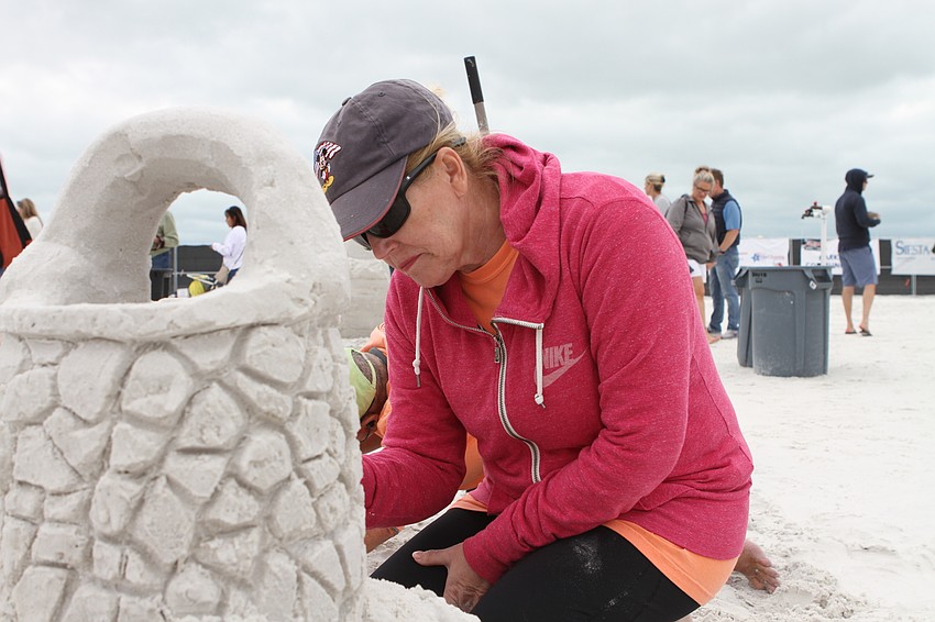Christy Agner worked on a wishing well.