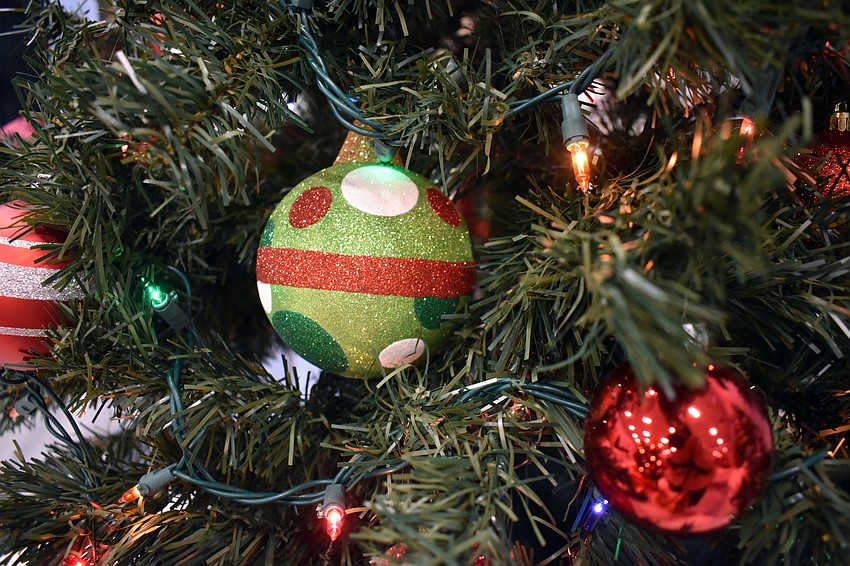 Patrons could buy fully-decorated Christmas trees of all sizes.