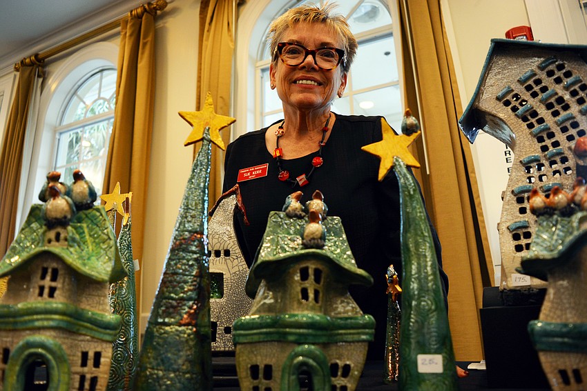 Waterlefe Golf and River Club's Sue Kerr shows off her whimsical raku-fired pottery.