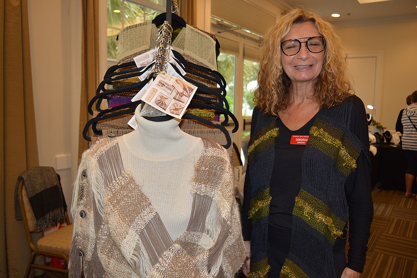 Newly joined member artist and Country Club at Lakewood Ranch resident Deborah Jernigan sells her natural fiber scarves, wraps and tunics. She came from California and said may adjust her offerings to suit Florida's climate.
