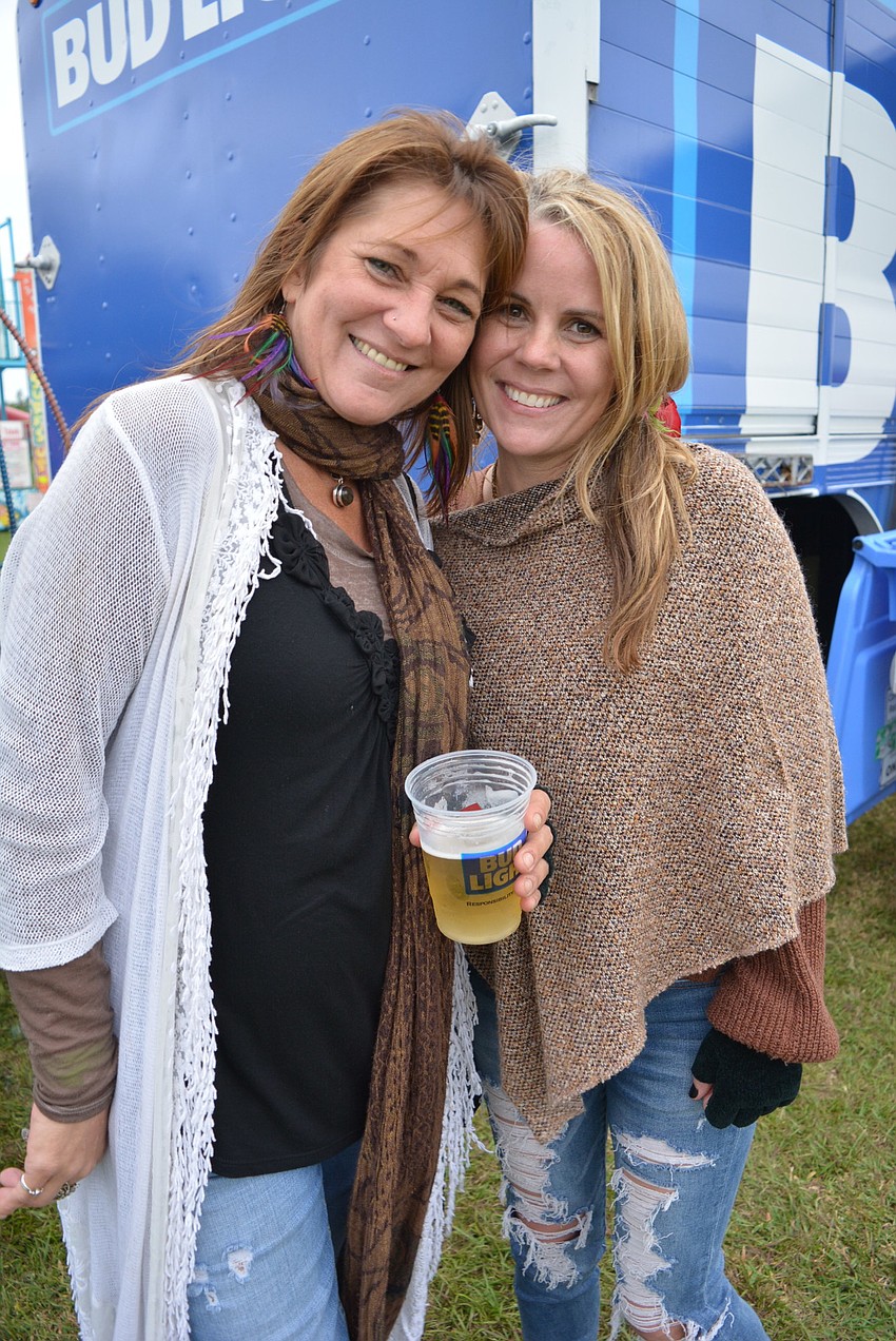 Sarasota's Marsha Wagler and Tara resident Pam Paxton enjoyed the music and some adult beverages.