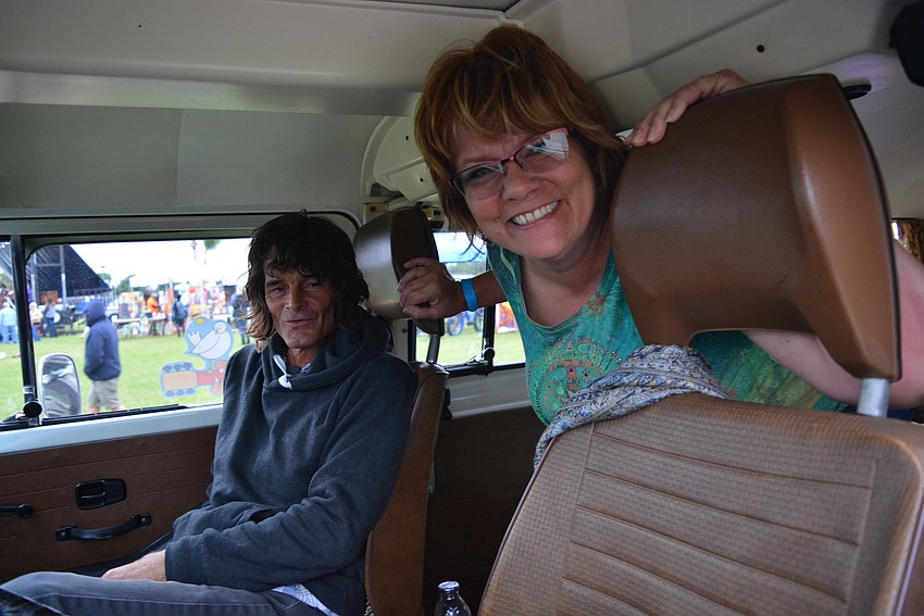 Erika Griesbach, with her sweetheart Brad Mlekush (behind), brought their 1977 Volkswagen bus which helped them stay warm.