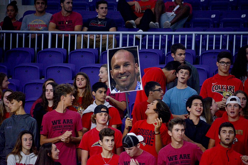 The Cardinal Mooney crowd brought a cutout of coach Chad Sutton's head to Fort Myers for the match.