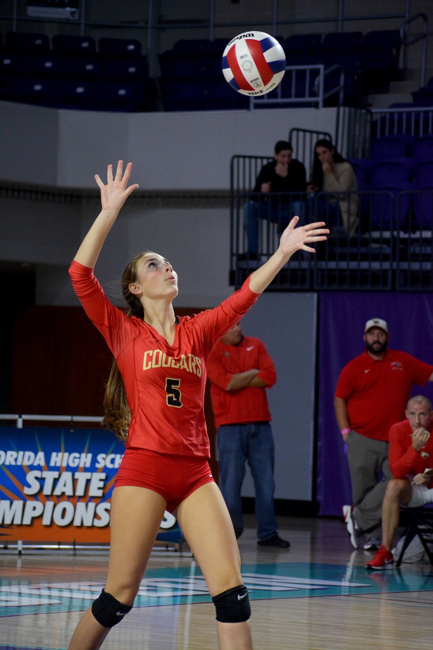Kara Klemeyer serves for Cardinal Mooney. She finished with 13 digs and an ace.