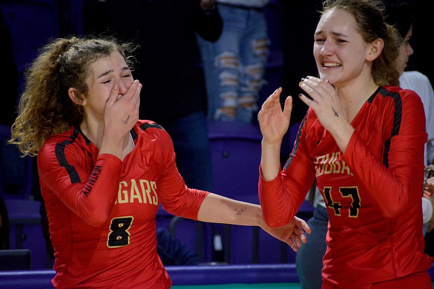 Sophia Hritz and Anna Klemeyer, both seniors, let the emotions flow after winning the state title.