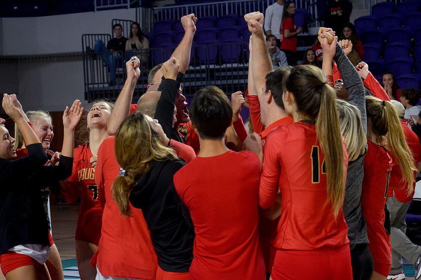Cardinal Mooney comes together for a final postgame huddle after winning the state championship.