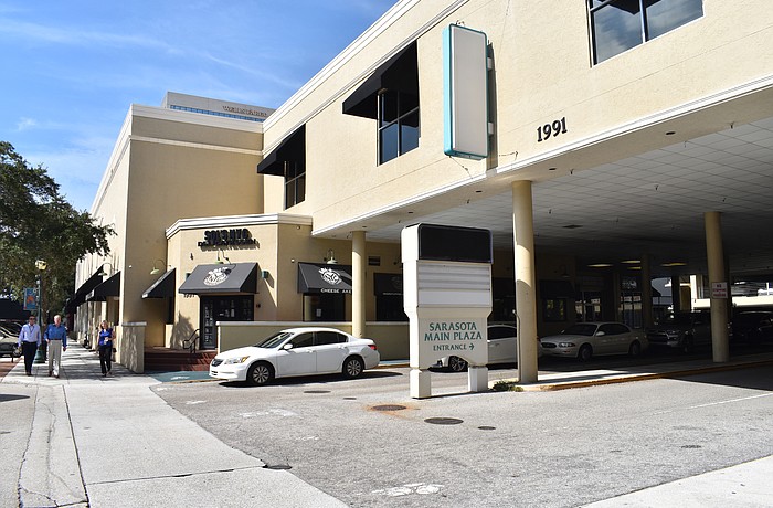 The owner of the Main Plaza shopping center plans to demolish the two-story commercial structure to make way for a primarily residential development.