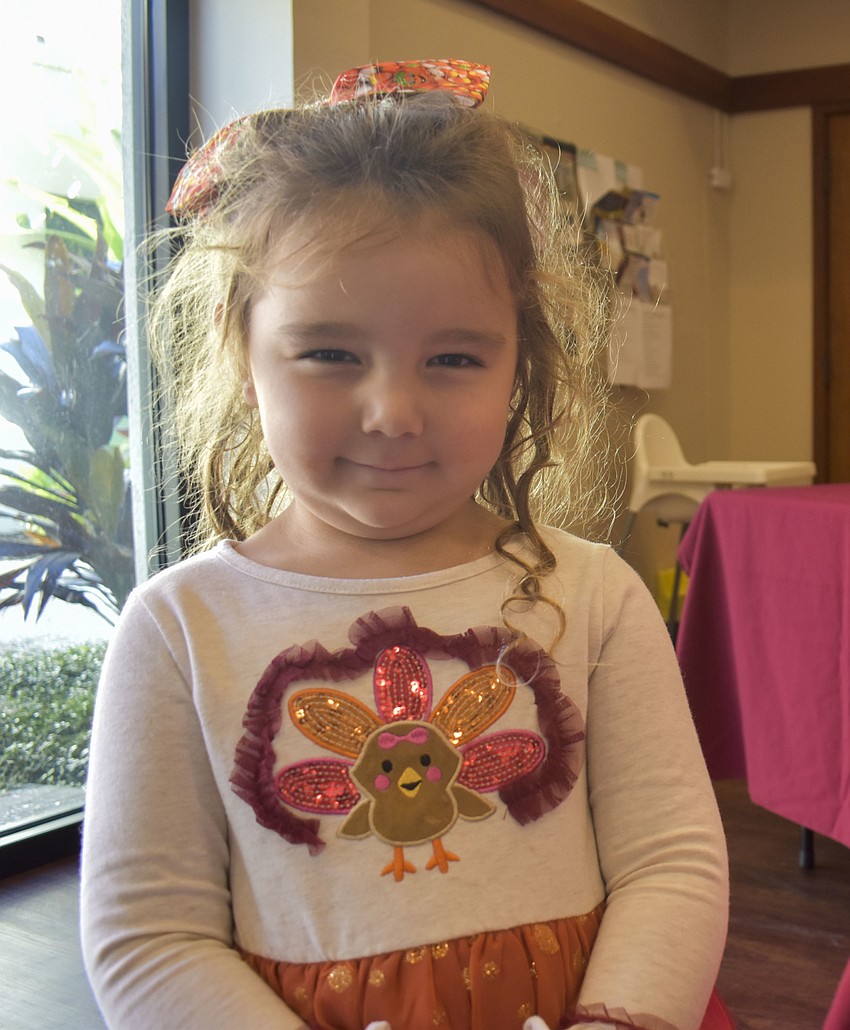 Audrey Helmuth sports a turkey dress for the pageant.