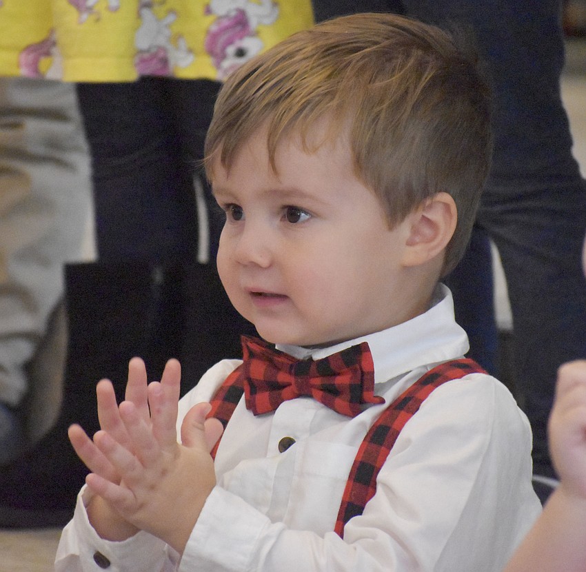 Eli Bressan claps along to 