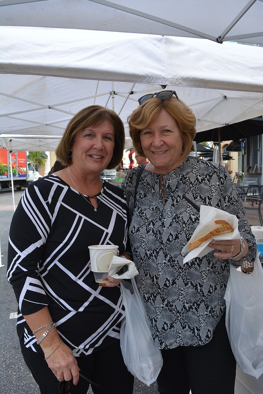 Mill Creek's Rae Dowling selects a clam chowder, while East County's Betsy Benac, an at-large Manatee County commissioner, samples a chicken curry.