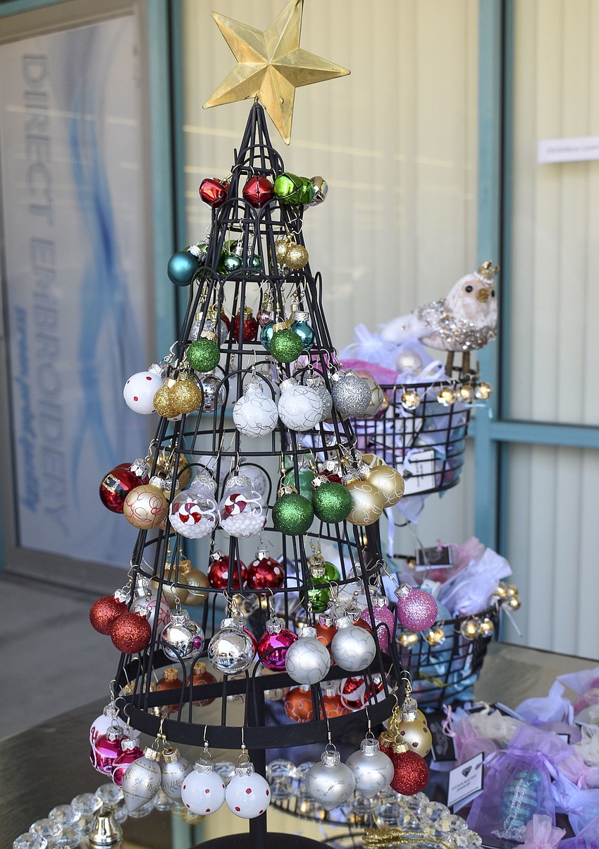 The Christmas jewelry is from Hawaii where Cindy Furtado owns The Cinderella Collection.