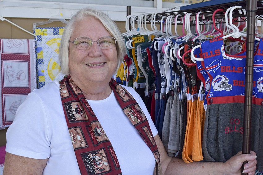 Shelley Campbell creates stove towels that look like dresses.