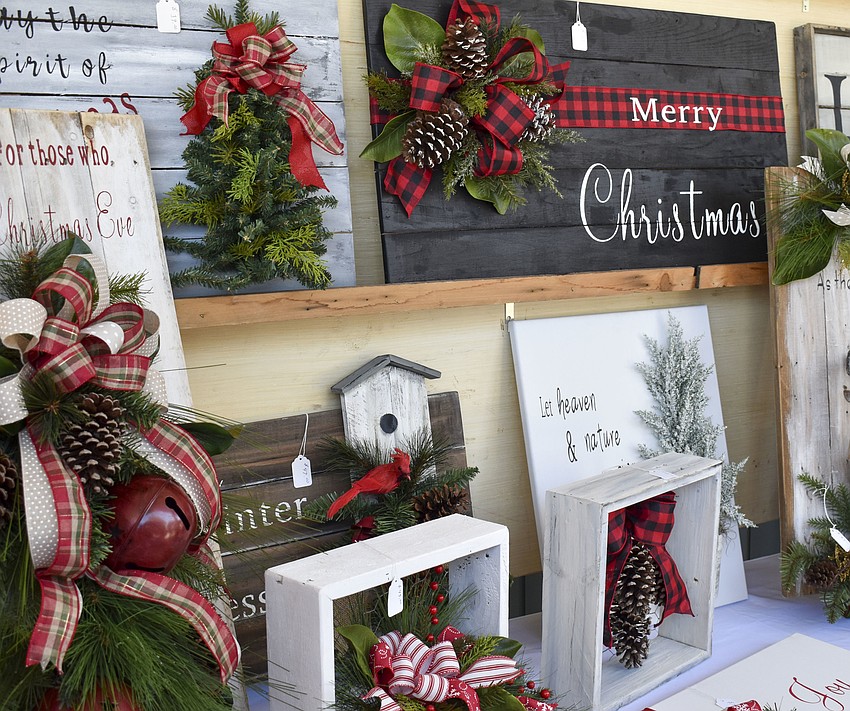 Christmas wood carvings come from Eugene Yancey.