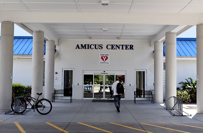 A patron walks into the Frank G. Berlin Sr. branch after it changed ownership.