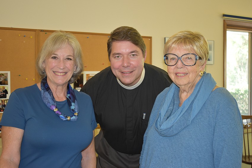 Ginny Upshaw, Father Dave Marshall and Janet Webb.