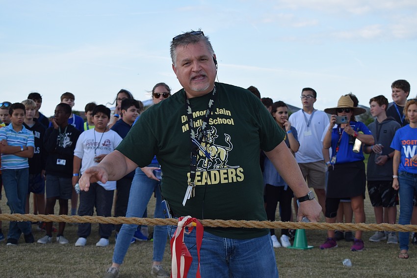 Steven Zickafoose, assistant principal, explains the rules of the tug of war.