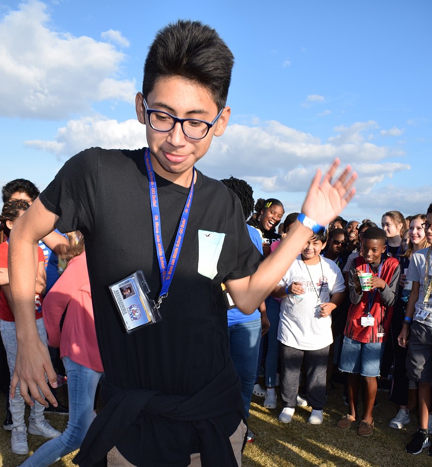 Armando Salmeron, a seventh-grader, showed off his moves during the school-wide dance at the end of the walk-a-thon.