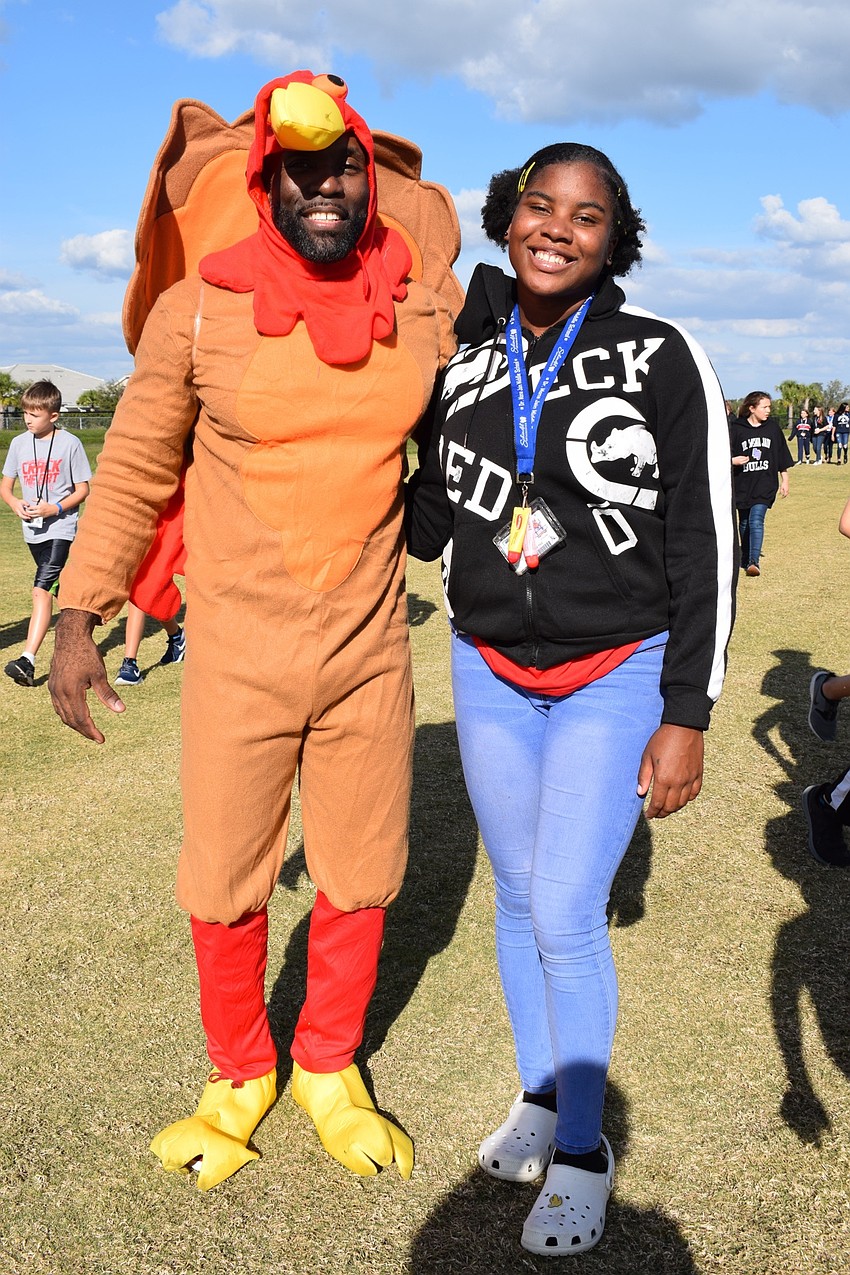 J.R. Boatwright, dressed as a turkey, and eighth-grader Jahnae Hill walked together. Boatwright gobbled every so often while walking.