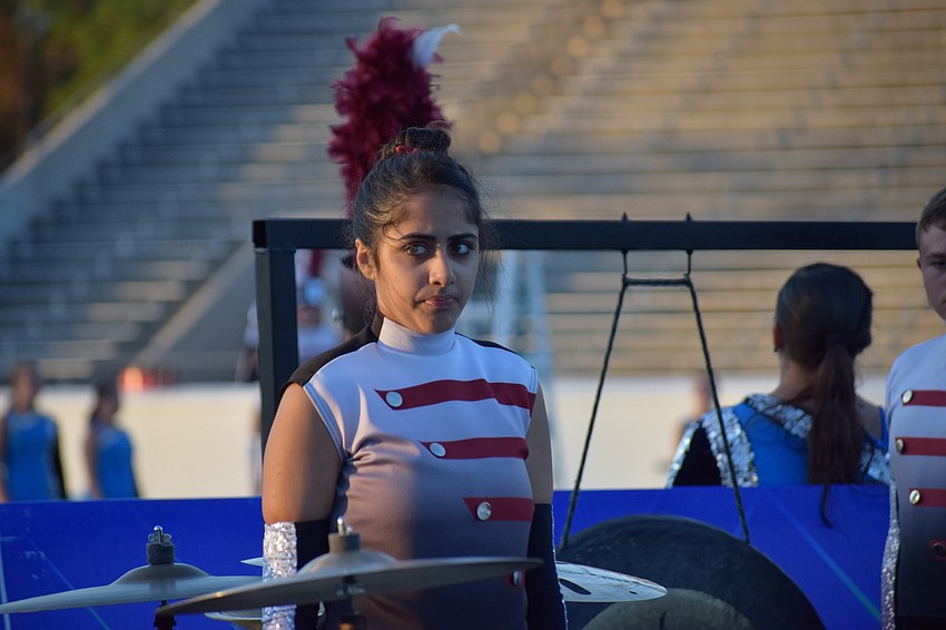 Aqila Patel, a Braden River senior, prepares to perform with the band for the last time.