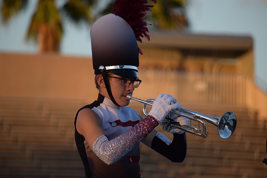 Braden River's Adam Sicard plays in unison with other trumpets.