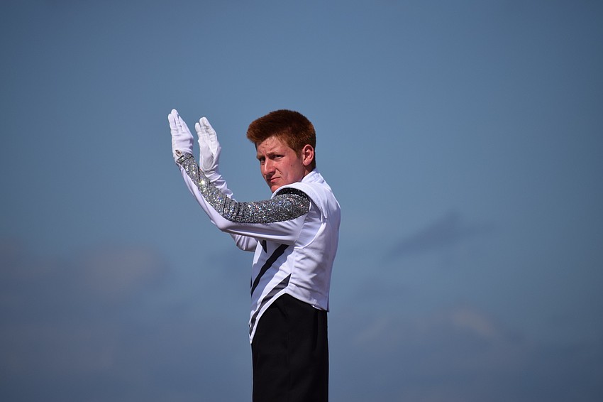 Eric Miller, a Lakewood Ranch senior, looks to senior Ethan Horn to ensure they're directing in the exact same tempo.