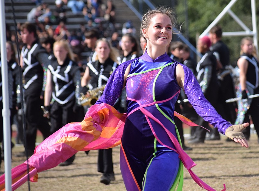 Lakewood Ranch's Shannon Ray smiles at the crowd while moving across the field.