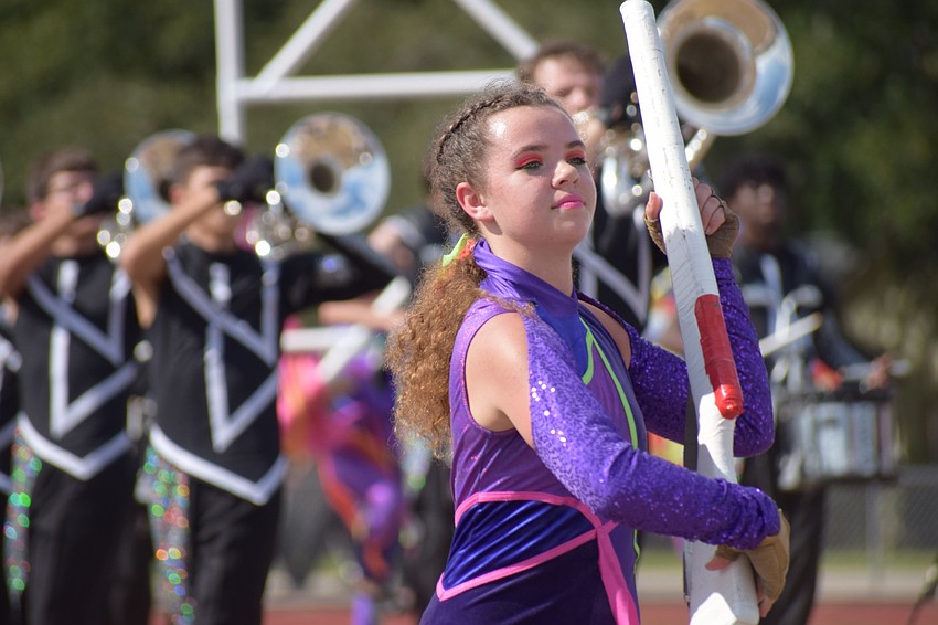 Lakewood Ranch's Julianna McCarter twirls her rifle.