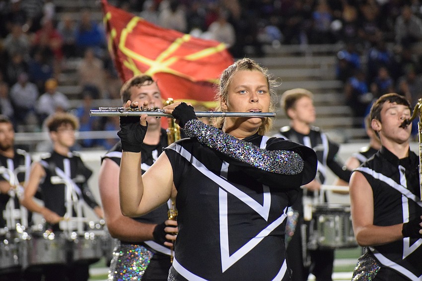 Lakewood Ranch junior Hannah Miller focuses on her movements and sound while marching.