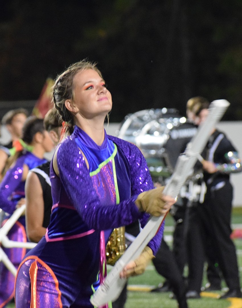 Lakewood Ranch senior Shannon Ray catches her rifle.