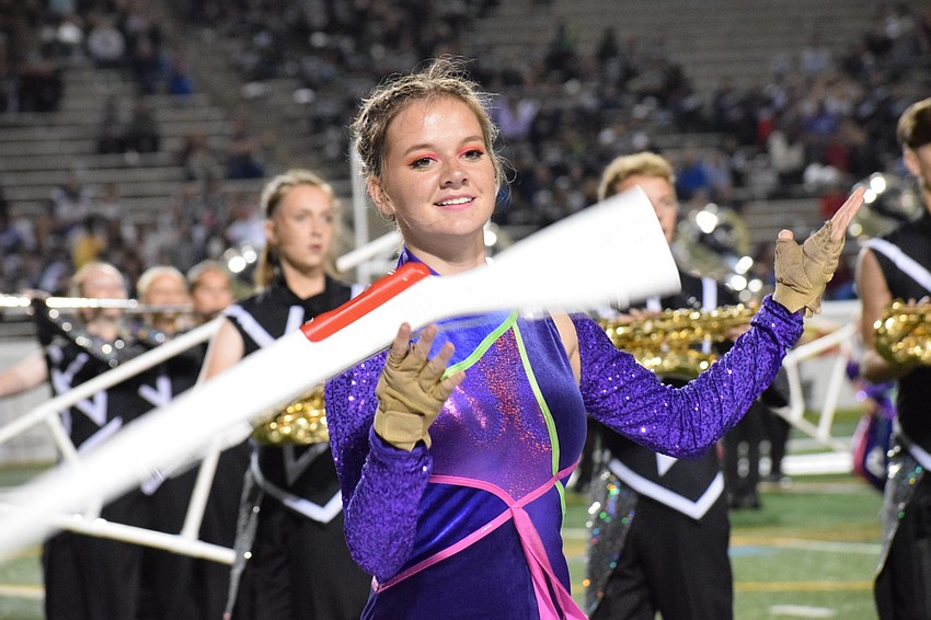 Lakewood Ranch senior Shannon Ray twirls her rifle.