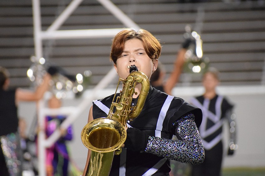 Lakewood Ranch sophomore Ellie Nauman keeps her eye on the conductor to know the tempo.