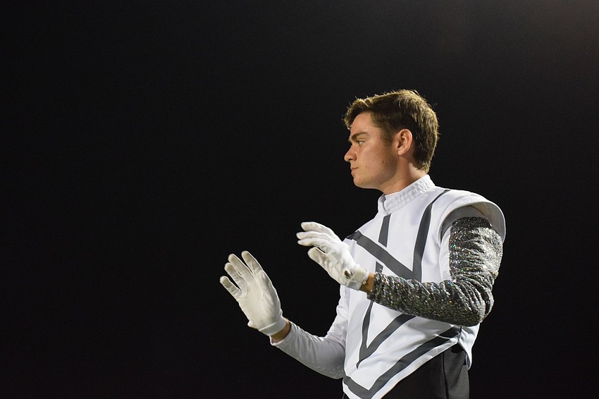 Lakewood Ranch senior Ethan Horn conducts his final Marching Mustangs performance.