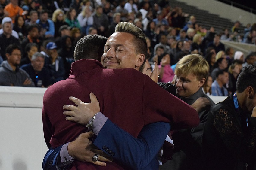 Braden River Director Jeramiah Bowman celebrates the announcement that Braden River placed first for the third time in the 3A division.