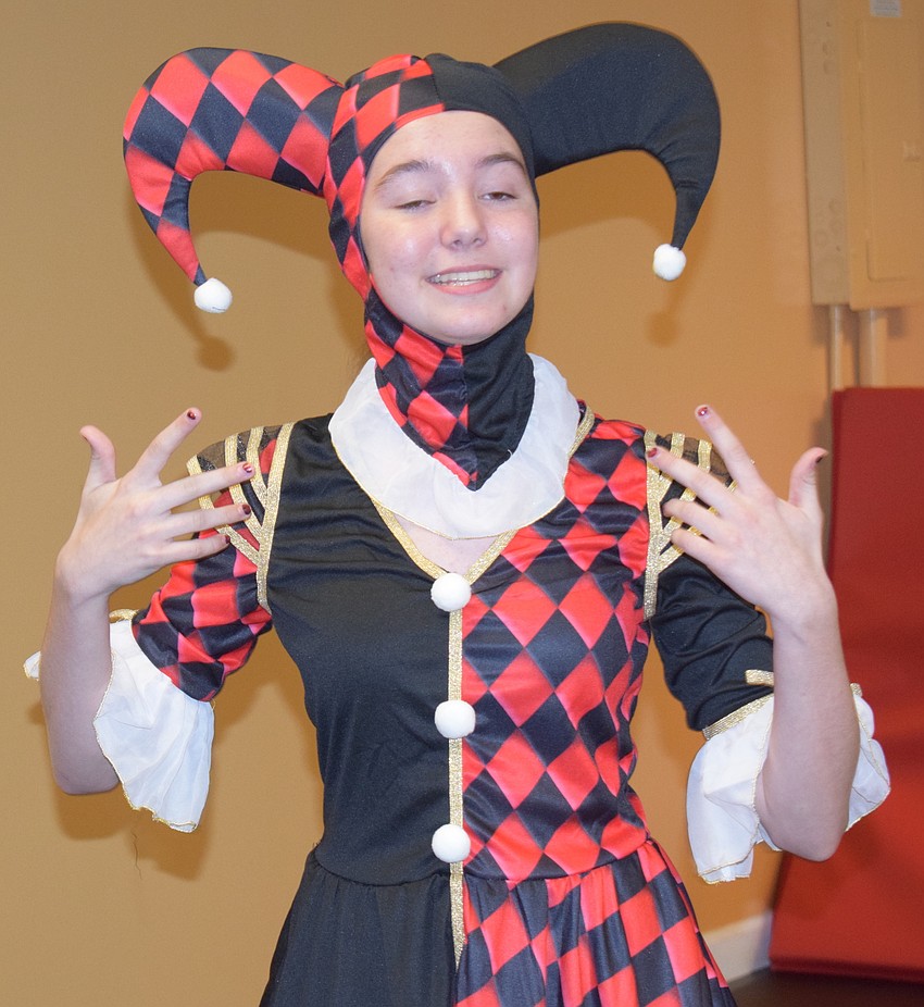 Juliana Mattes works on her roll as a Harlequin doll in The 12 Dolls of Christmas.