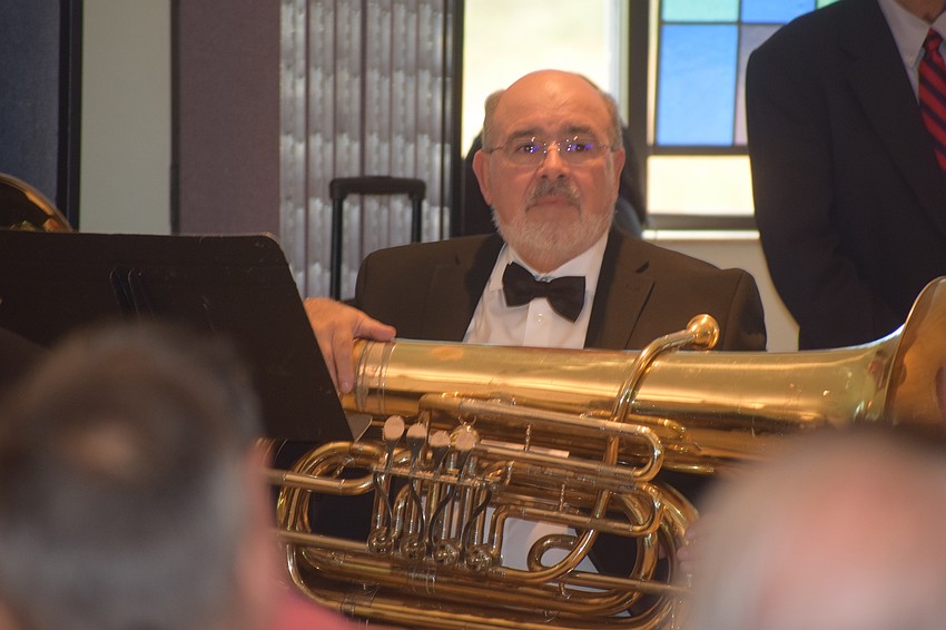 Sarasota's Jim Damoulakis waits his turn during the performance.