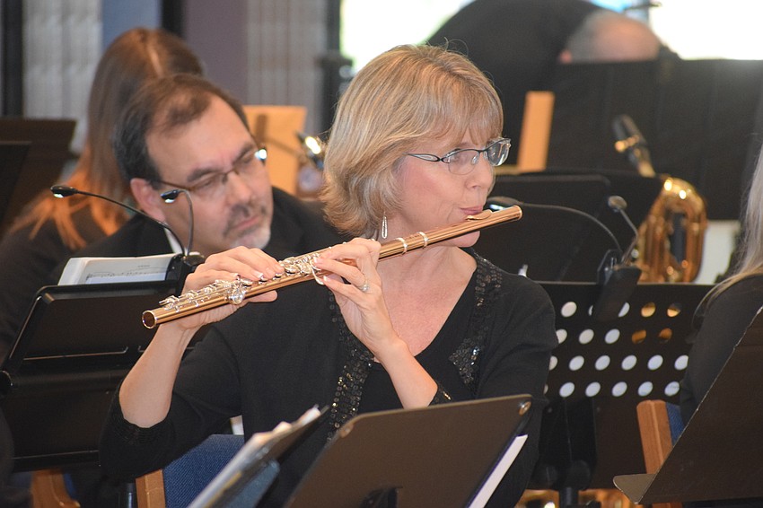 Sarasota's Karen Romig, the first flute, said many of the musicians played together in the Venice and Port Charlotte areas.