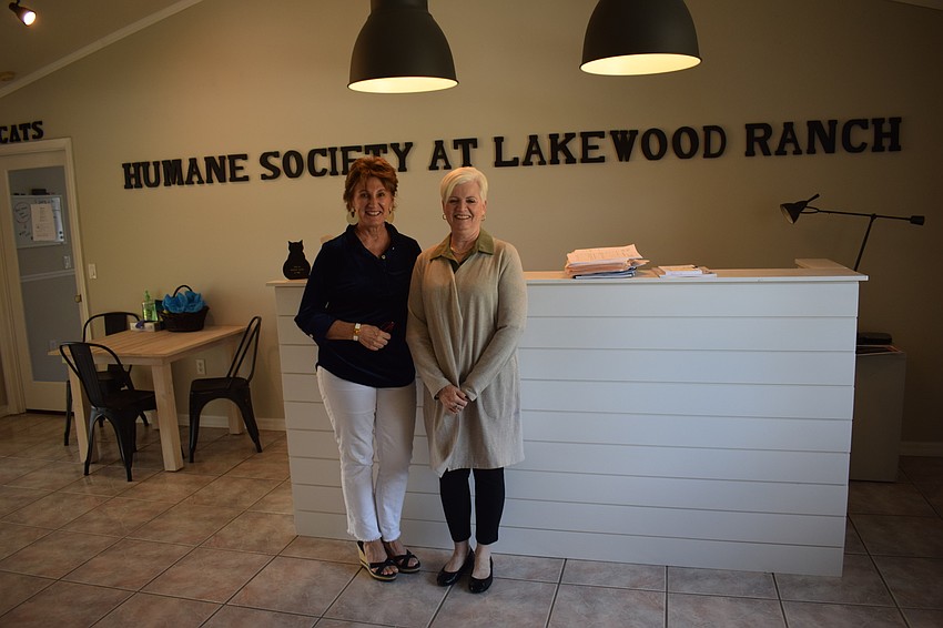 Susan Giroux and Deanna Murchie stand in the house on the property in Myakka City that has been converted to an administration office.