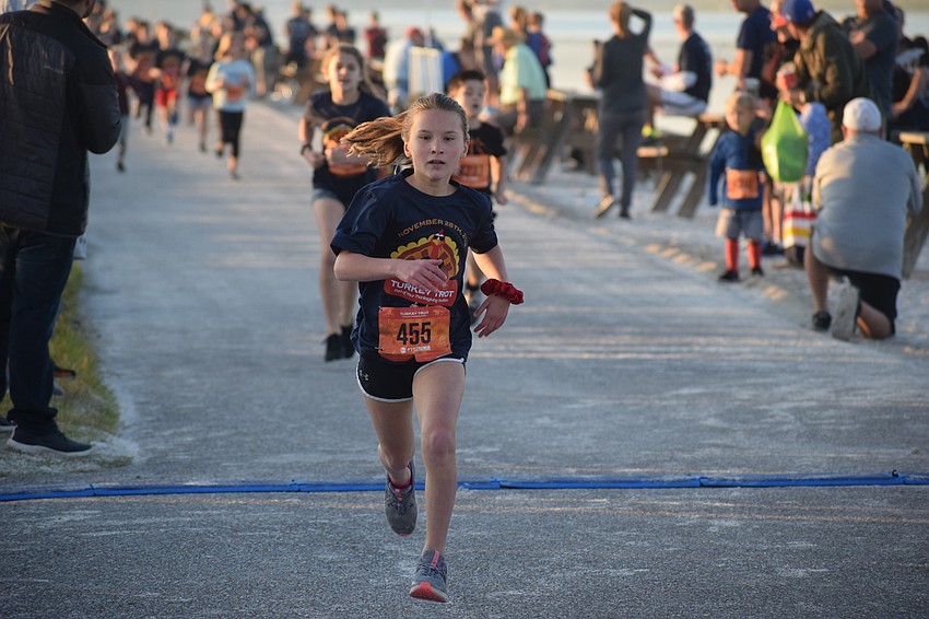 Finley Laxton of Rolesville, N.C., won a kids dash even though she is a soccer player and not a runner. She was in town visiting relatives.