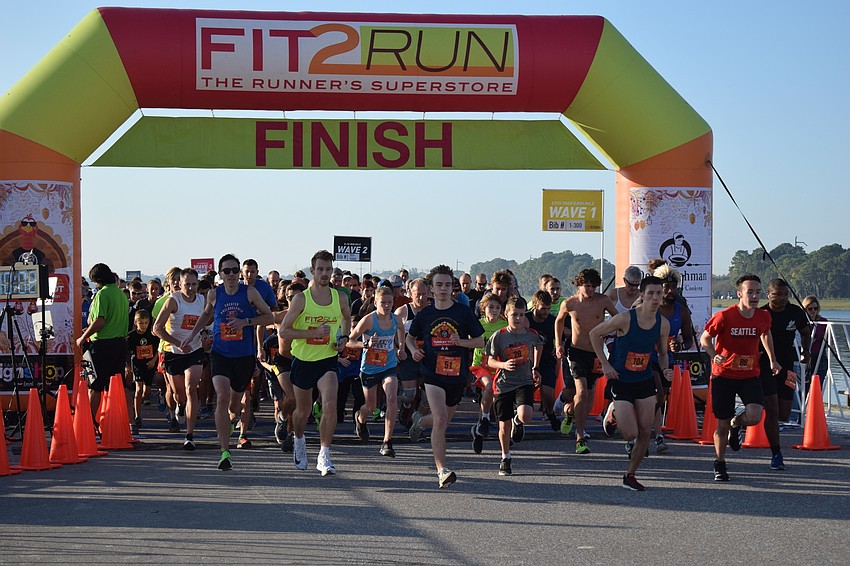 The runners take off for the start of the race. It took more than eight minutes to get all the 2,649 runners through the start gate.