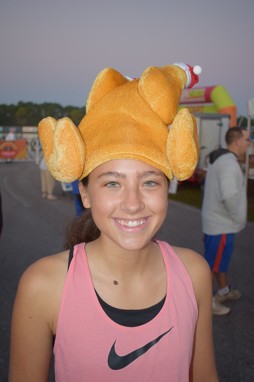 Christina Vazquez of Woodridge, N.J. is visiting her grandma in Sarasota but she took time out for the race.