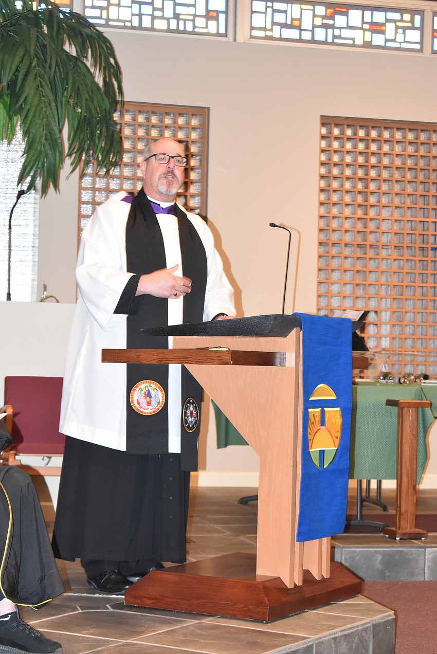 The Rev. Ken Blyth welcomed people to the church as the pastor in charge of the location.