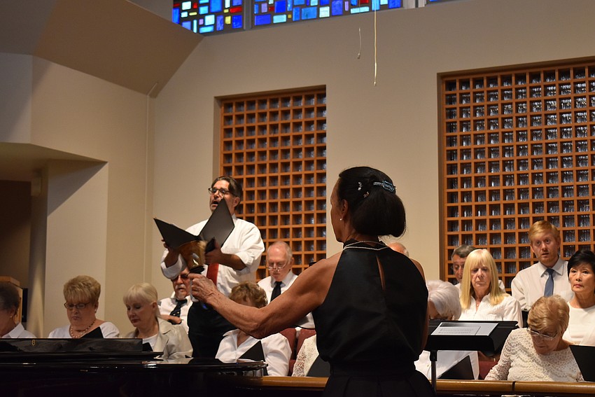 Dr. Ann Stephenson Moe of Temple Beth Israel leads the choir.