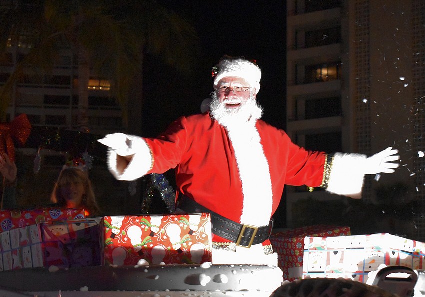Santa Claus rounds out the parade.